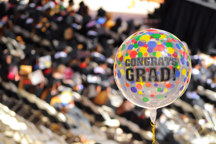 Congrats Grad celebratory balloon at graduation ceremony. Click to register.