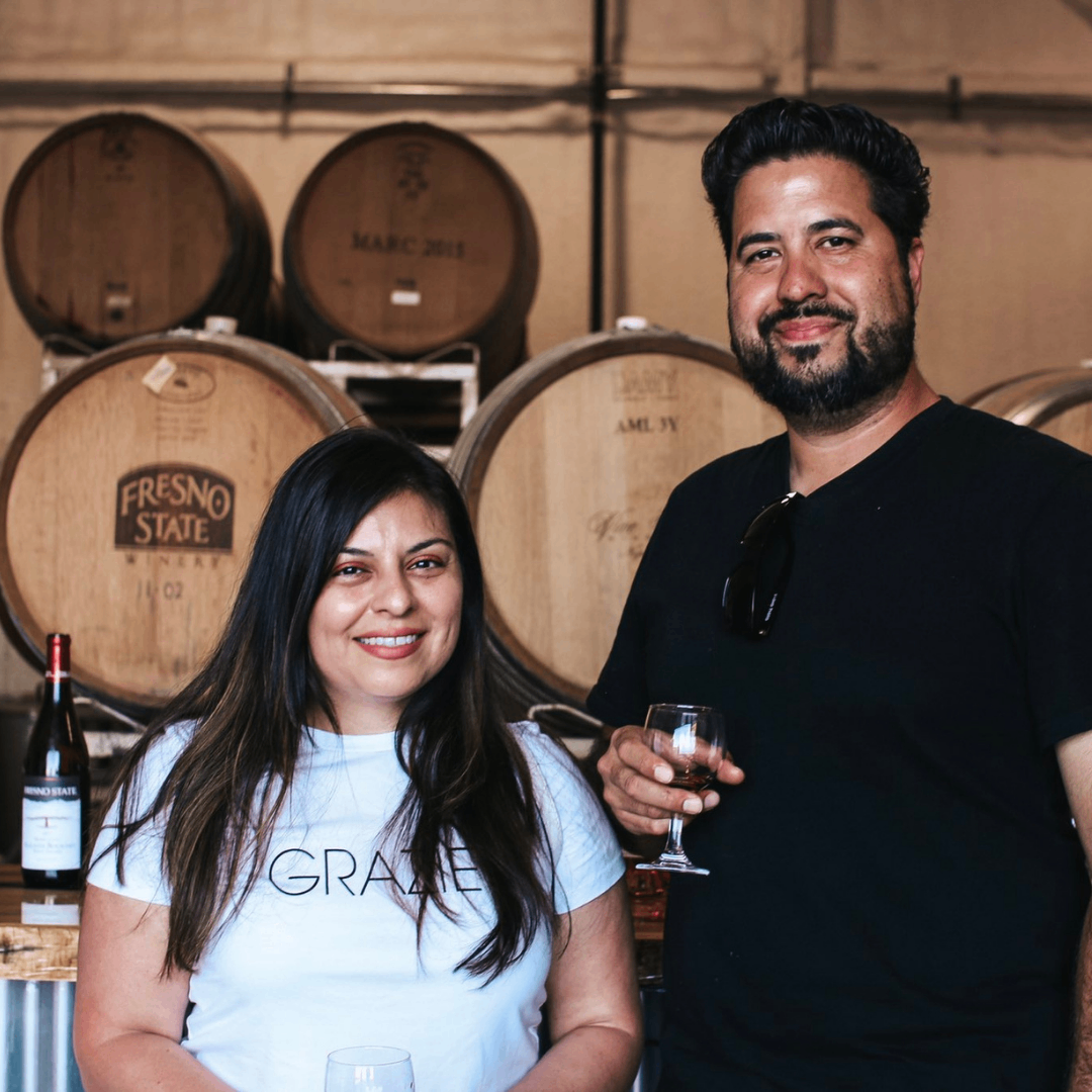 A couple wine tasting at Fresno State Winery