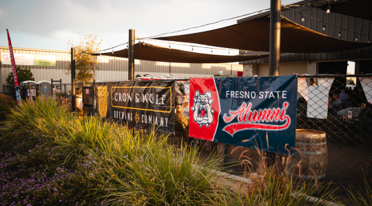 alumni banner at crow and wolf